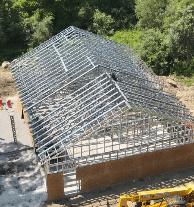 Aerial view of steel frame barndominium construction in Louisiana
